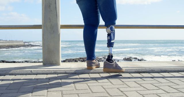Person with Prosthetic Leg Standing by Ocean View - Download Free Stock Images Pikwizard.com