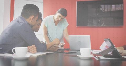 Business meeting over devices and coffee for collaborative success