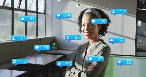 Biracial Businesswoman Surrounded by Social Media Metrics in Modern Office