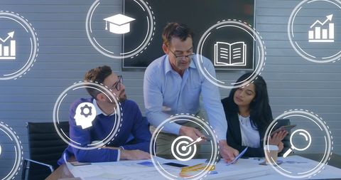 Diverse Team Collaborating with Digital Business Icons in Office