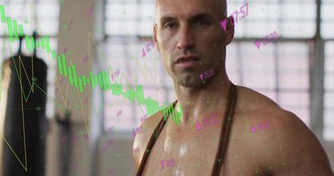Male athlete breathing after intense gym workout showing augmented reality data overlay