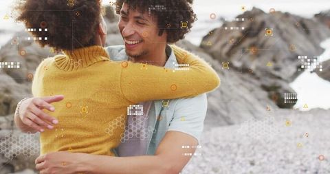 Romantic Couple Embracing on Beach with AR Elements