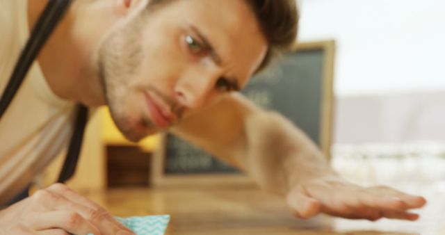 Focused Barista Cleaning Coffee Shop Counter - Download Free Stock Images Pikwizard.com