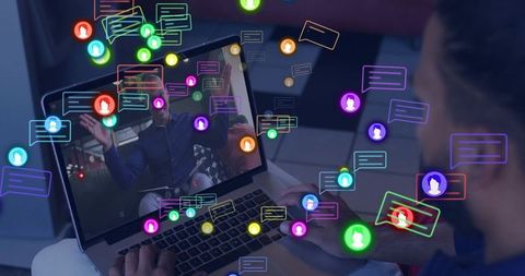 Remote collaboration and virtual meeting on laptop with colorful floating chat icons