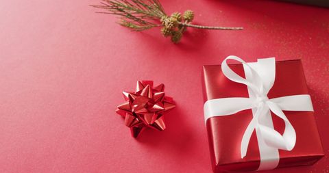 Festive Red Christmas Gift with White Ribbon - Download Free Stock Images Pikwizard.com