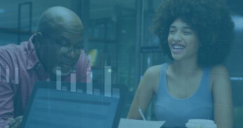 Smiling Business Team Analyzing Financial Data in Modern Office