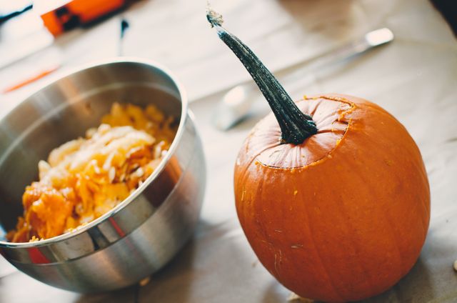 Pumpkin Carving Preparation for Halloween Celebrations - Download Free Stock Photos Pikwizard.com