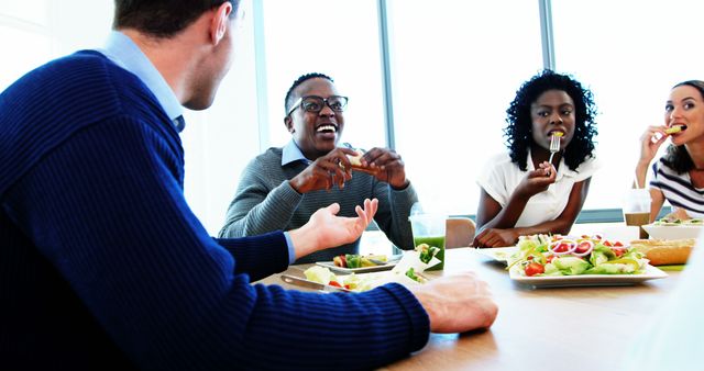 Coworkers Enjoying Lunch Together in Office Break Room - Download Free Stock Images Pikwizard.com