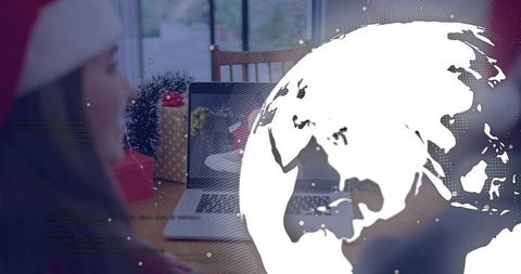 Family celebrating holiday video call at home with laptop, wrapped gifts and globe overlay