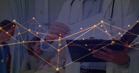 Doctor reading patient records with digital network overlay for modern healthcare data