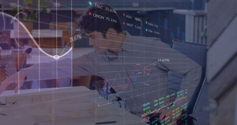 Businessman Analyzing Financial Data in Modern Office Environment