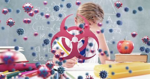 Schoolboy Studying Amidst Covid-19 Concerns in Classroom