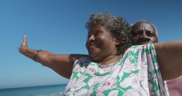 Happy Senior Couple Enjoying Beach Vacation Together - Download Free Stock Images Pikwizard.com