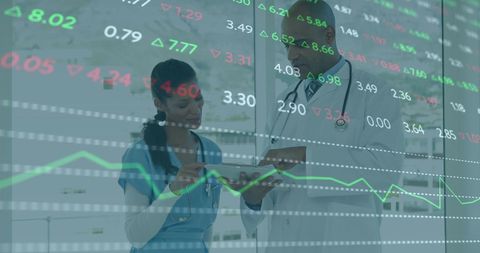doctors analyzing financial data in hospital environment - Download Free Stock Images Pikwizard.com
