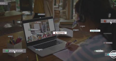 Girl wearing headset writing while attending remote classroom with ar overlays on laptop
