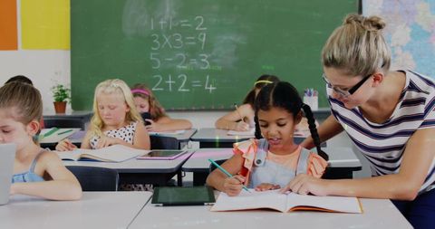 Diverse Classroom with Engaged Students and Teacher Interaction - Download Free Stock Images Pikwizard.com