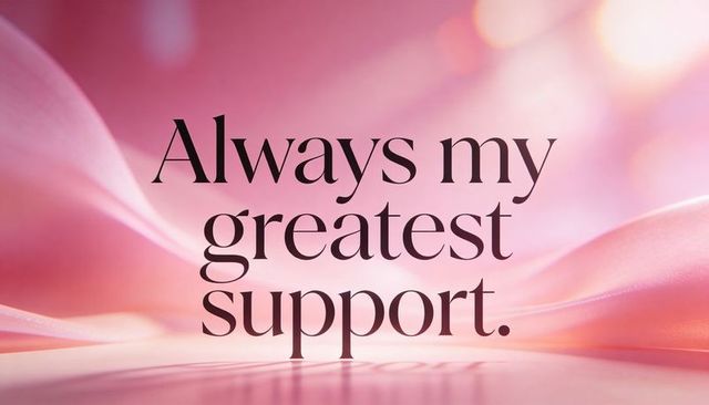 Inspirational 'always my greatest support' serif lettering on pastel silk drapery with soft bokeh