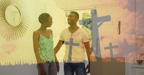 Couple Embracing in Modern Home with Spiritual Cross Overlay