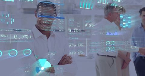 Businessman studying financial dashboards and data overlays, crossing arms, bright office