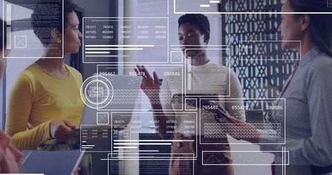 Women Collaborating with Interactive Data Dashboards on Glass Wall for Analytics