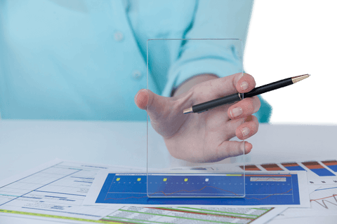 Businesswoman with Pen and Transparent Device at Office Desk - Download Free Stock Videos Pikwizard.com