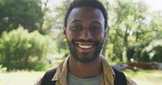 Smiling Man Enjoying Nature Hike Outdoors - Download Free Stock Images Pikwizard.com