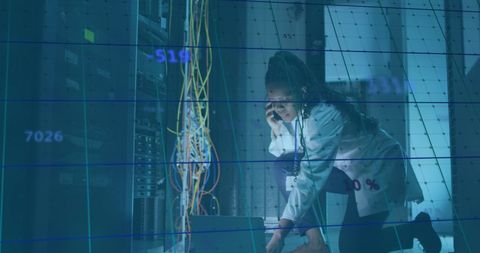 IT Professional Analyzing Data by Computer Servers - Download Free Stock Images Pikwizard.com