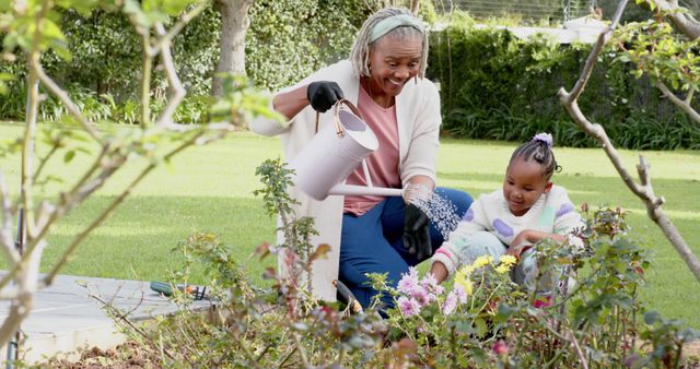 Grandmother and Granddaughter Gardening Together on Sunny Day - Download Free Stock Images Pikwizard.com