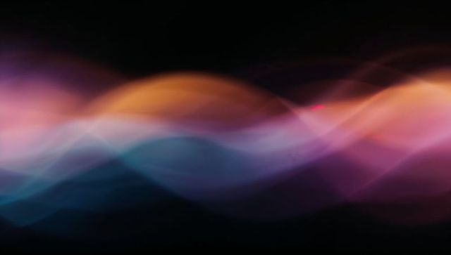 Vibrant Flowing Multicolored Light Waves on Dark Background