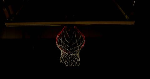 Dramatic Basketball Hoop Lit Against Dark Background - Download Free Stock Images Pikwizard.com