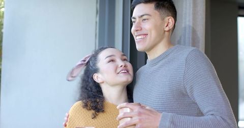 Diverse Couple Enjoying Cozy Moment Together at Home