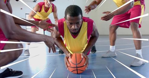Intense Basketball Action: Athlete Focused on Court