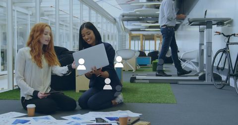 People Collaborating in Modern Office with Digital Data Concept