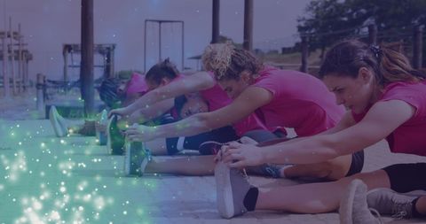 Diverse Women Exercising Together at Outdoor Obstacle Course