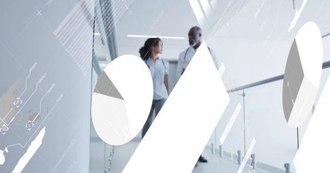 Analyzing Data Trends Walking Office Hallway