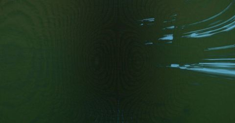 Abstract blue light trails creating surrealistic pattern