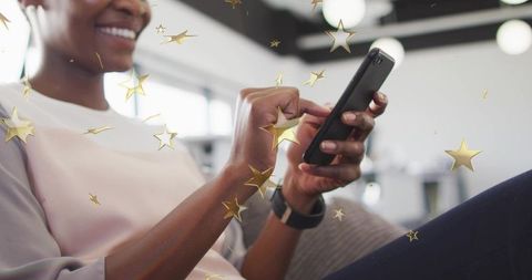 Businesswoman Engaging with Smartphone in Bright Office Lounge