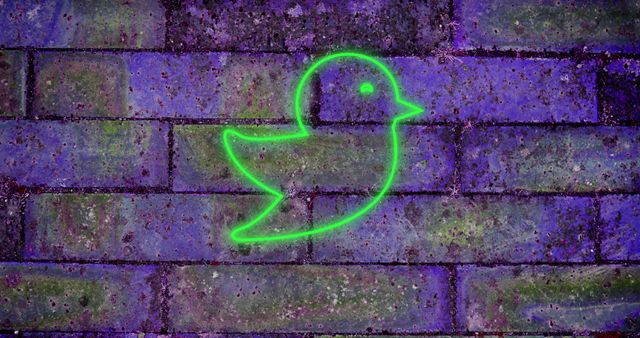 Green Neon Bird on Graffiti Brick Wall Symbolizes Social Media - Download Free Stock Images Pikwizard.com