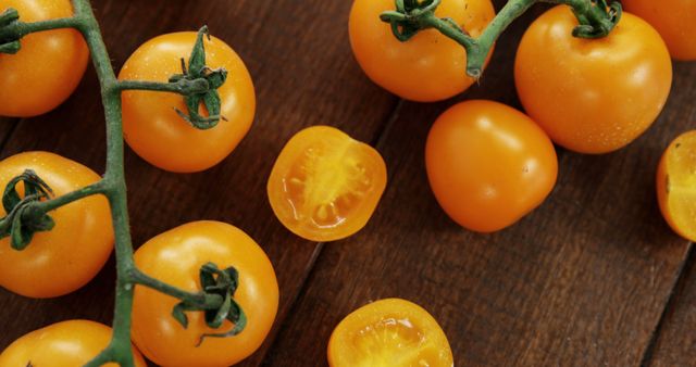 Fresh Yellow Cherry Tomatoes on Wooden Surface - Download Free Stock Images Pikwizard.com