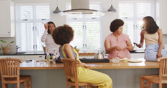 Group of Friends Socializing in Modern Kitchen Interior - Download Free Stock Images Pikwizard.com