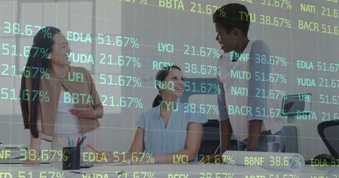 Diverse Business Team Analyzing Digital Stock Market Data in Office