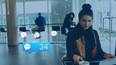 Woman Engaged with Tablet in Modern Office Network Setting