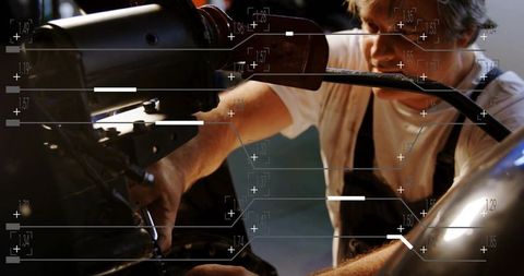 Mechanic diagnosing car engine under open hood with wrench and diagnostic overlays