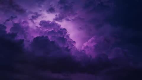Pulsing Violet Thunderhead Swelling and Emitting Lightning at Dusk
