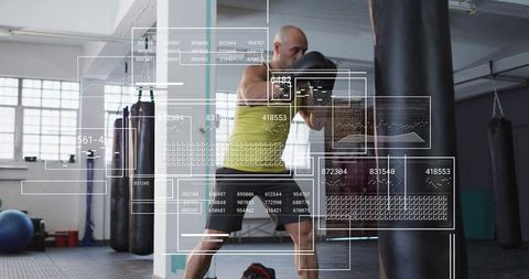 Boxing athlete training with heavy bag and futuristic hud fitness data overlay