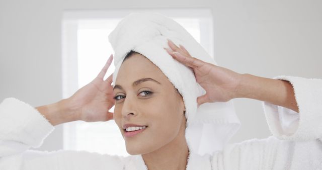 Woman with Towel Turban Smiling Post Shower Indoors - Download Free Stock Images Pikwizard.com