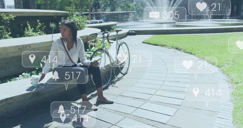 Businesswoman with Social Media Icons in Urban Park