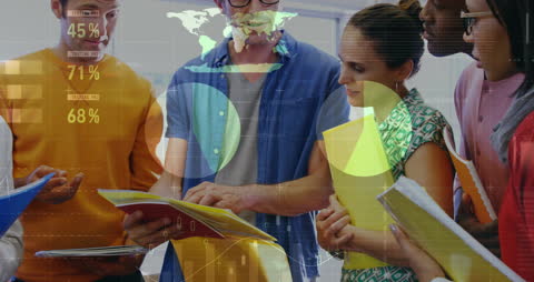 Diverse Business Team Analyzing Financial Data with Digital Visuals