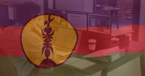 Employee Working on Laptop in Office with Transparent Flag Overlay