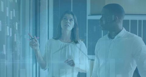 Diverse Professionals Analyzing Financial Data Visualization Overlay